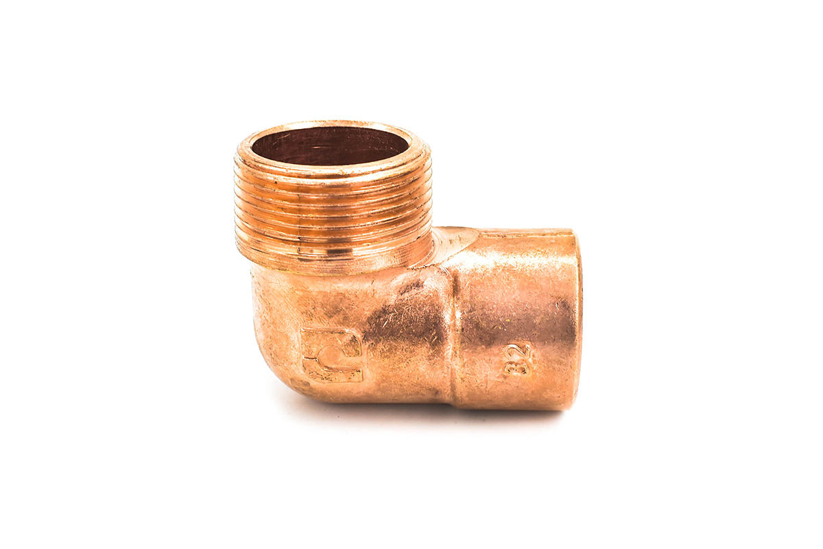 Codo de cobre con exterior de fierro 32 mm (1 1/4