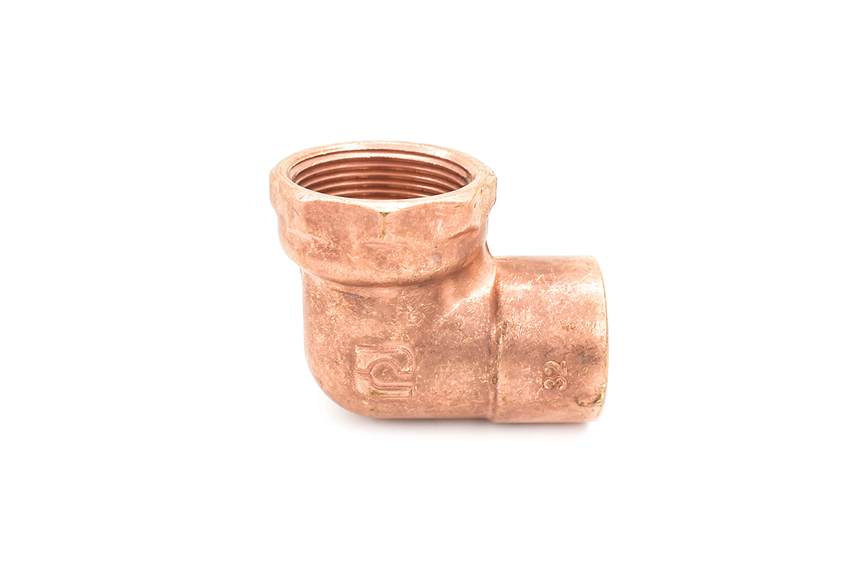 Codo de cobre con exterior de fierro 32 mm (1 1/4