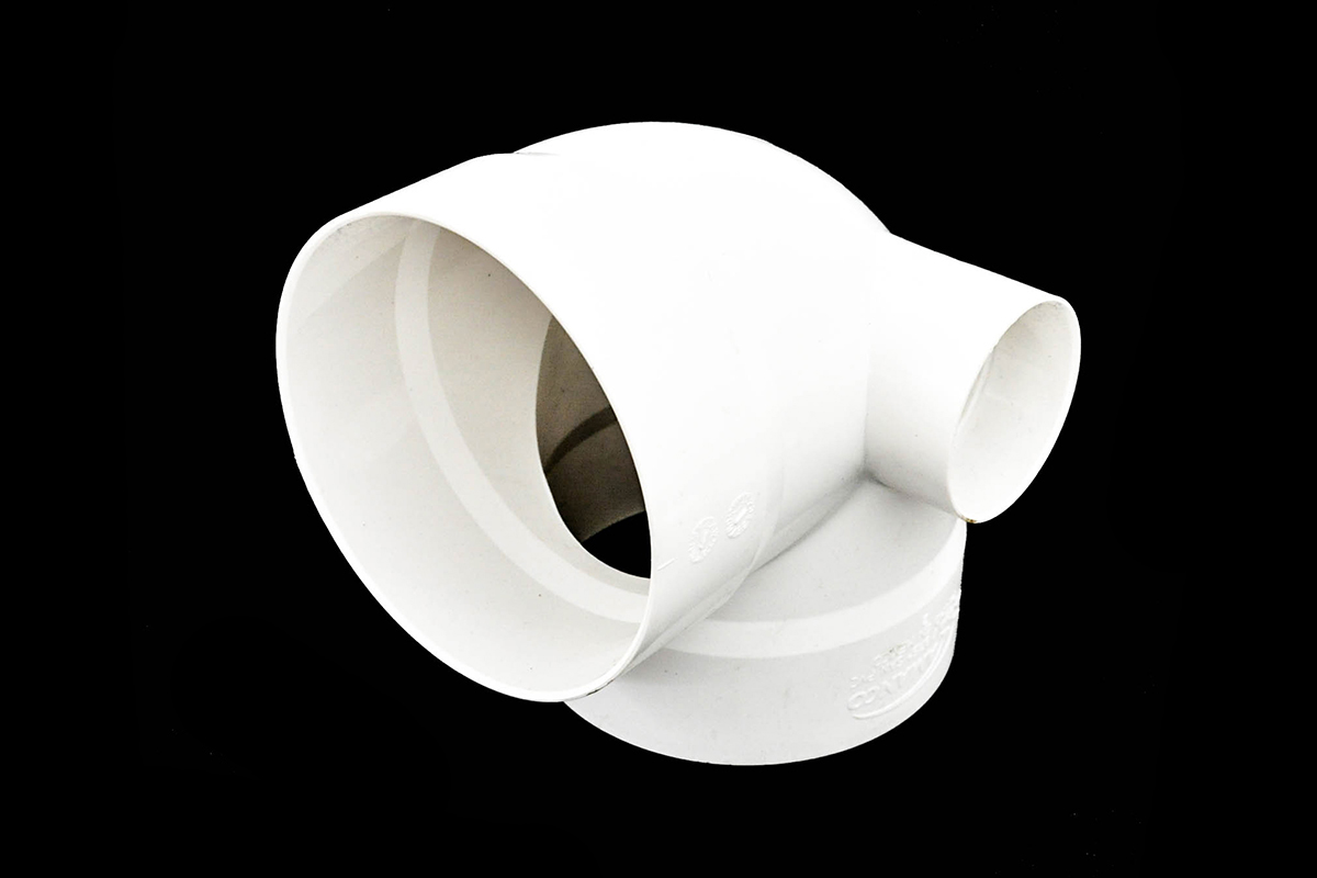 Codo con salida lateral de 100 x 50 mm para cementar