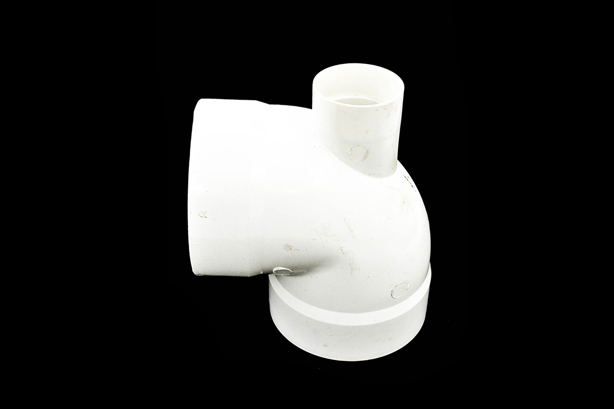 Codo con salida trasera de 100 x 50 mm para cementar 